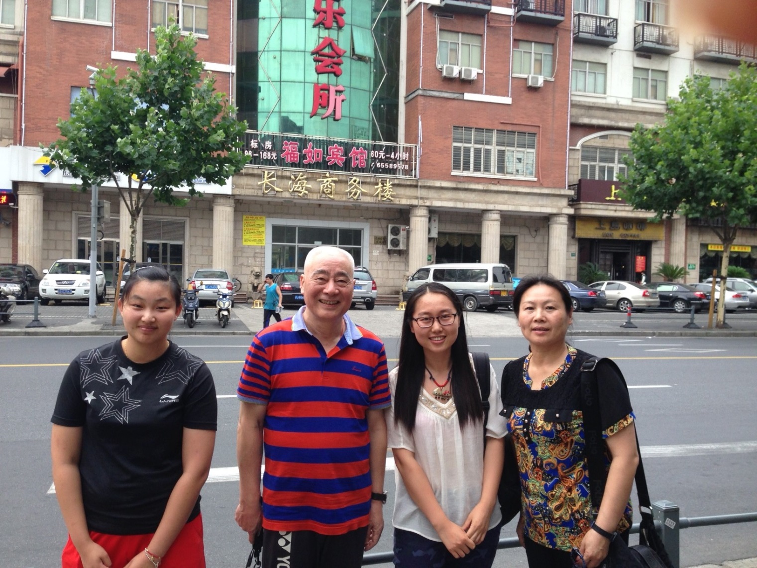 Miss Li, Professor Dai, Dingyi and Coach Ma, from left to right